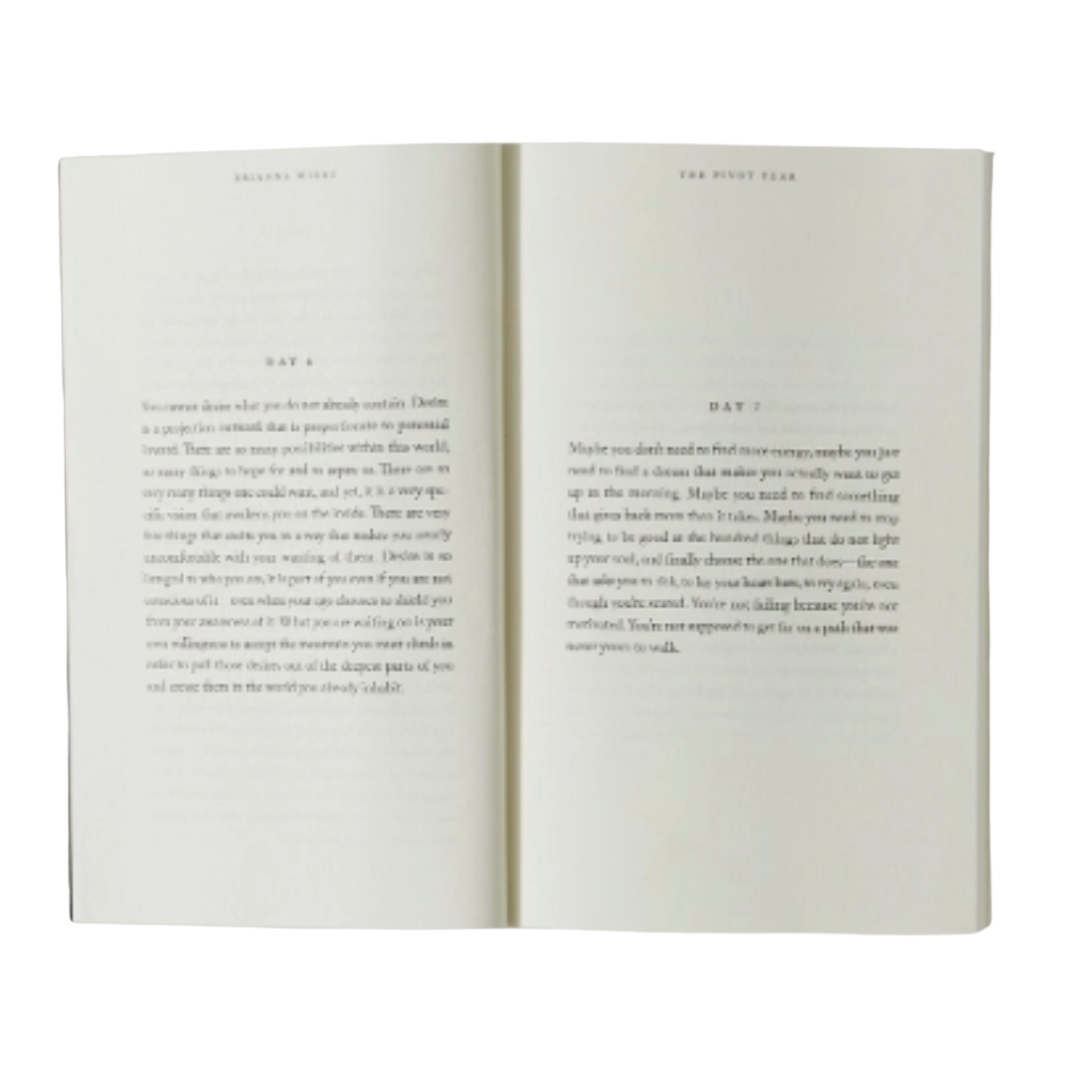 Open pages of the book titled Pivot Year displayed on a white background.