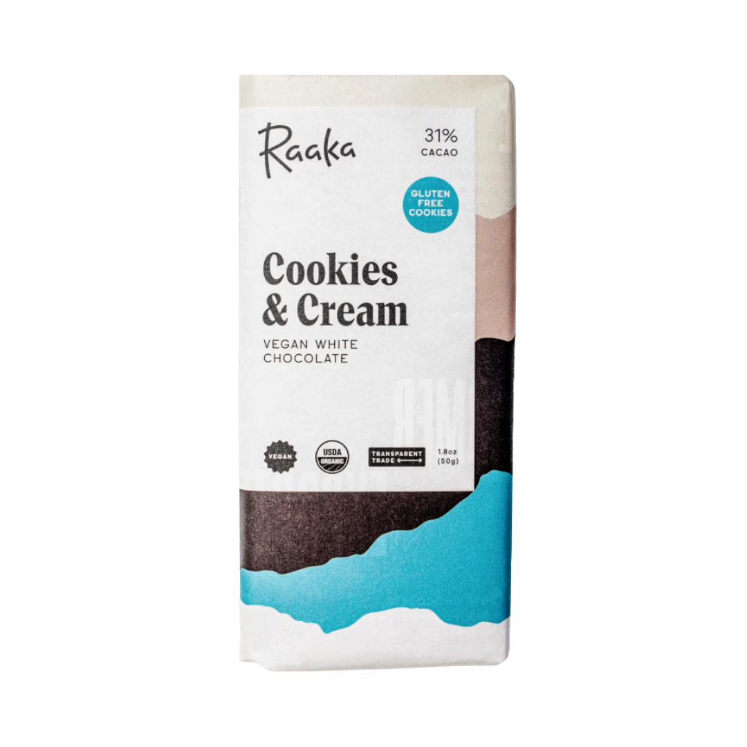 Raaka Cookies & Cream vegan white chocolate bar with blue and white packaging on a white background.