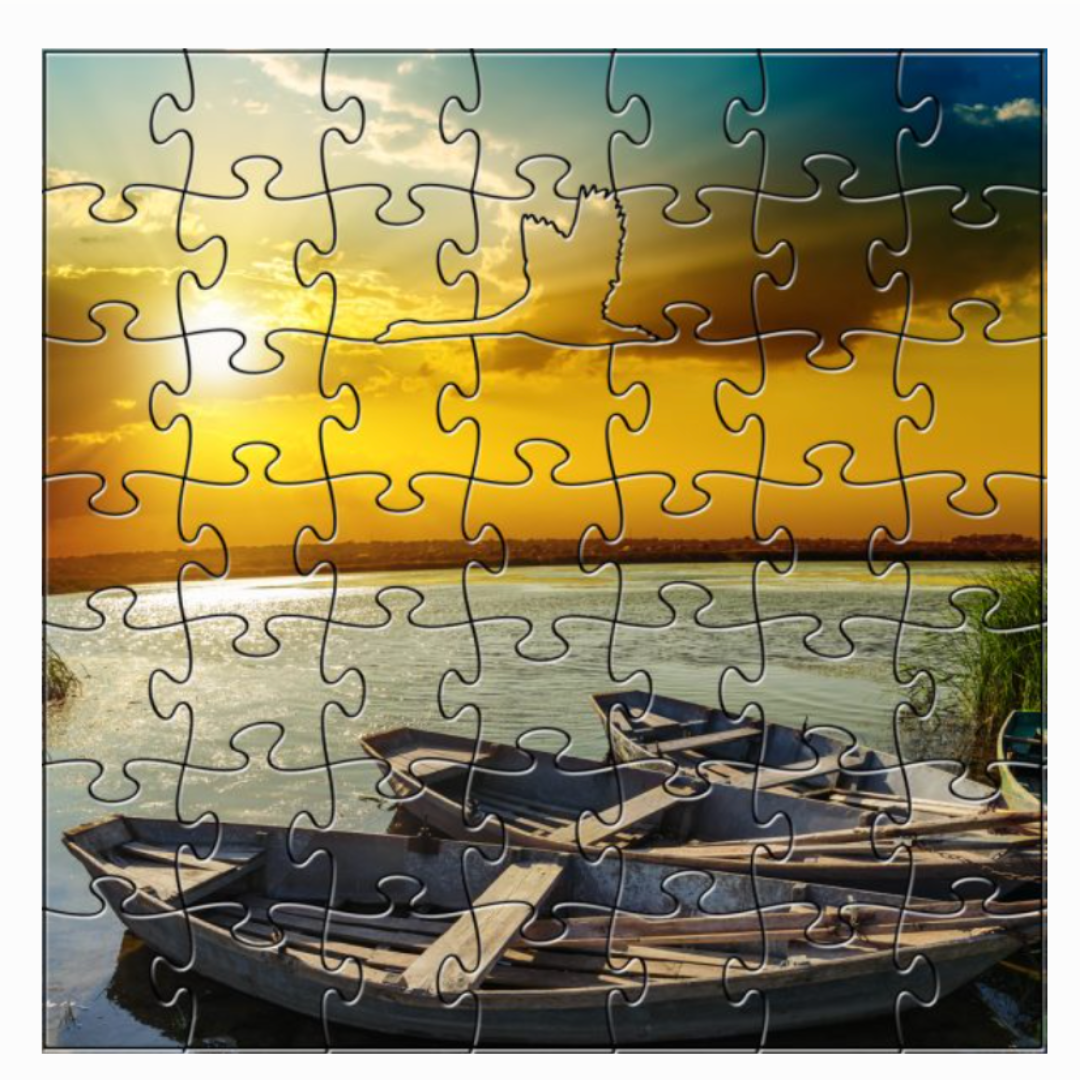 Zen Wooden Jigsaw Puzzle displayed next to its box, highlighting its heirloom-quality craftsmanship and artistic design. The puzzle's 50 pieces are shown with their detailed, eco-friendly wooden construction and elegant patterns.