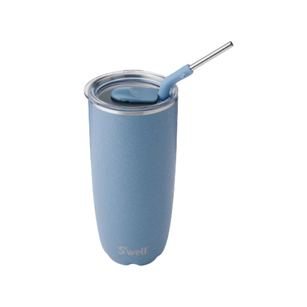 Blue insulated tumbler with straw on a white background.