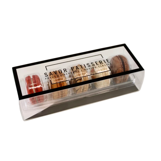 Savor Patisserie's Five-Pack French Macarons Gift Box featuring vibrant macarons in flavors like Red Velvet, S'mores, Salted Caramel, Fruity Pebbles, and Chocolate, elegantly packaged for special occasions.