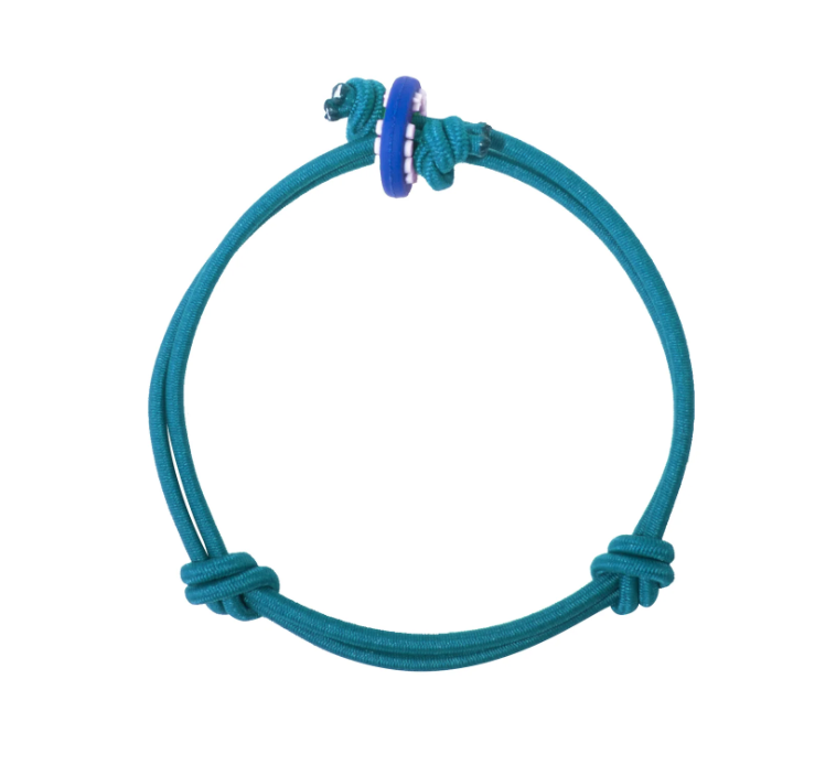 Adjustable teal bracelet made by Colors For Good  embodies balance.