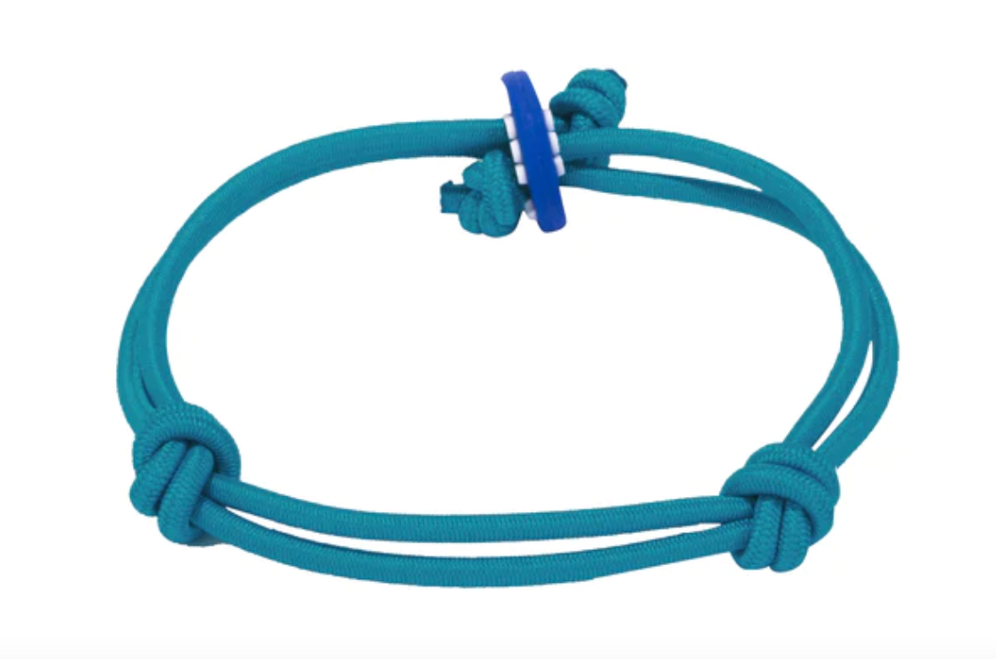 Adjustable teal bracelet embodies balance and is made by Colors For Good.