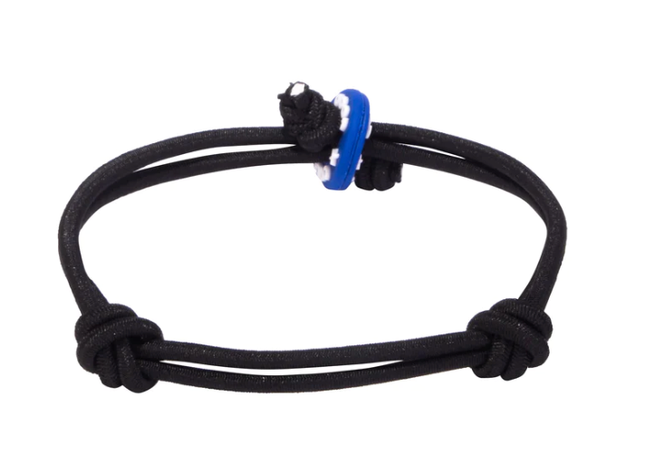Sleek black bracelet, adjustable for power.