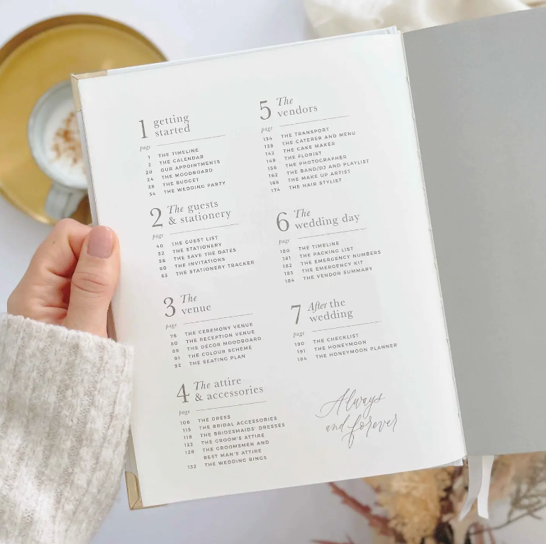 Plan your perfect day with this opulent gold-edged wedding book.