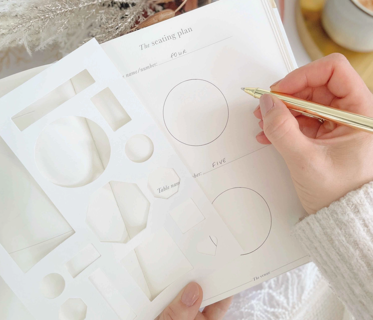 Glamorous wedding planning made easy with this gold-covered book.