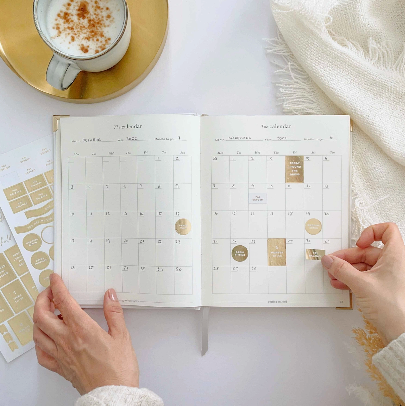 Plan your perfect day with this opulent gold-edged wedding book.