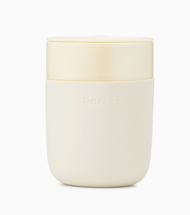 12 oz white ceramic mug with a cream silicone sleeve, showcasing a sleek and modern design by W&P.