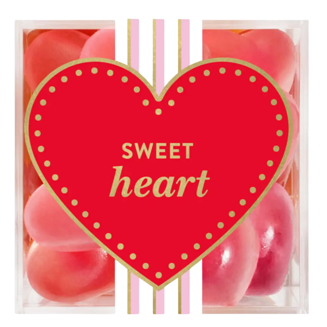 Sweet Heart Strawberry Gummy Hearts by Sugarfina in a stylish acrylic cube. These sweet and tangy heart-shaped candies are bursting with juicy strawberry flavor, perfect for Valentine’s Day, anniversaries, or as a special treat.