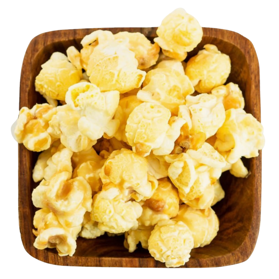 Wooden bowl filled with popcorn on a white background.