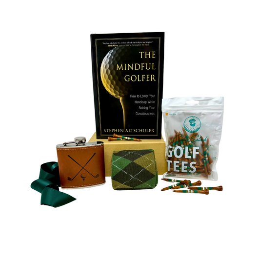 A meticulously curated TEE TIME GOLF GIFT BOX from Me To You Box, featuring premium golf-themed items: stylish men's argyle crew socks, a golf design leatherette hip flask in a branded gift box, the inspirational "The Mindful Golfer" hardcover book, and a pack of 50 durable birch hardwood golf tees. Perfectly packaged for the passionate golfer, this custom gift box combines luxury, functionality, and thoughtful curation to elevate any golfing experience.