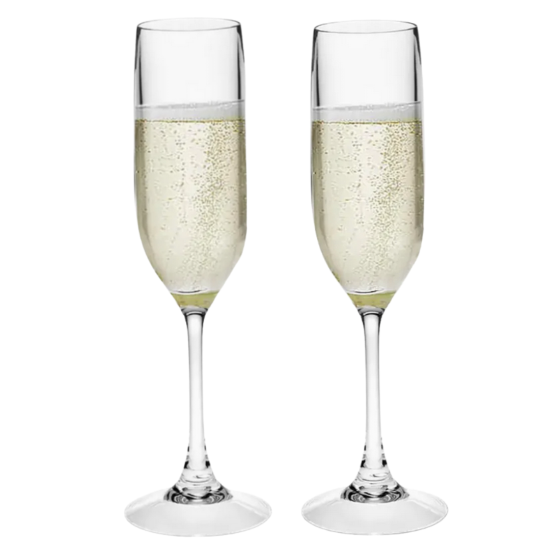 Two champagne flutes filled with sparkling wine on a white background.