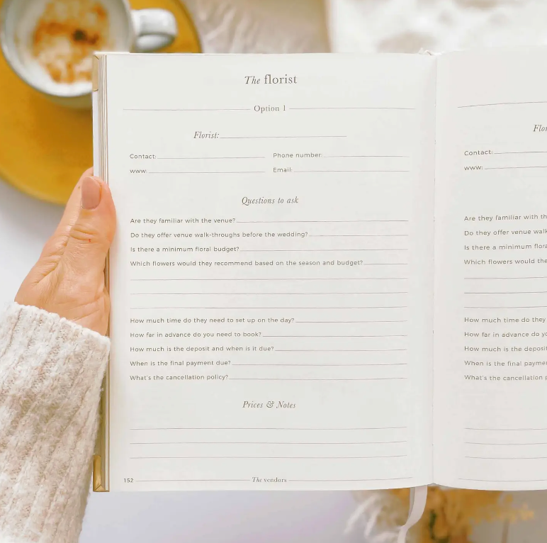 Gorgeous hardcover wedding organizer with radiant gold accents.