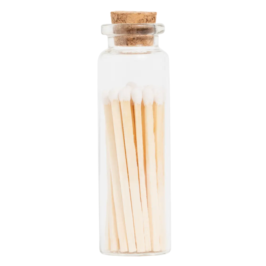 Glass jar with cork top holds 20 white-tipped two inch wooden matches, creating a stylish and functional fire-starting display.