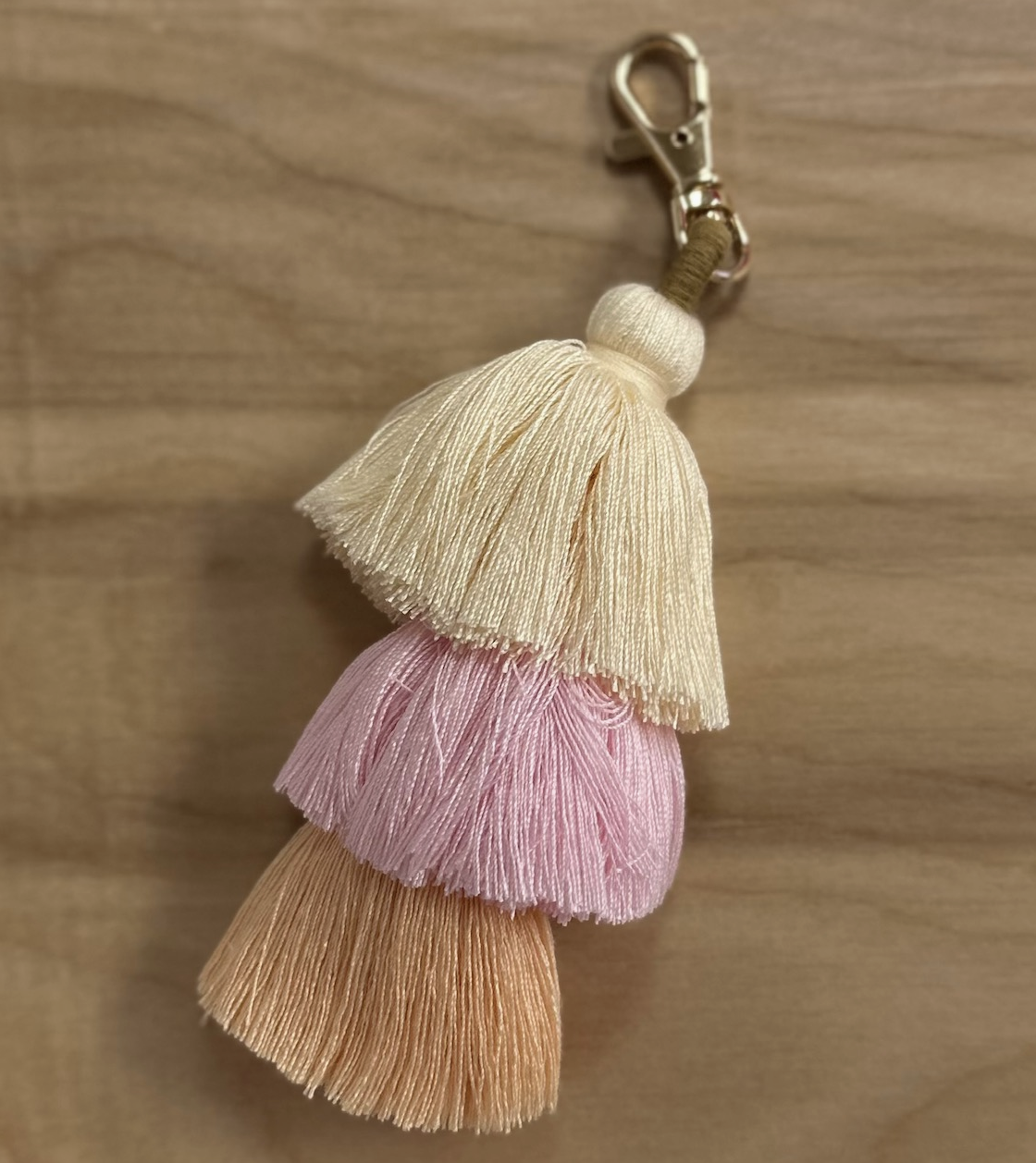 Three tier pink ombre tassel to adorn a purse for the curated Me To You Box called Fun In The Sun.