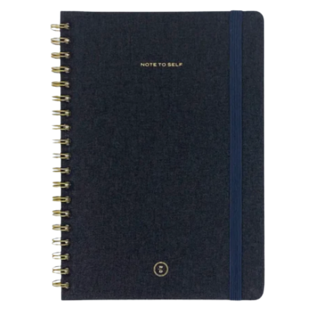 Stylish spiral-bound charcoal linen journal with lined pages and elastic closure for organized note-taking.