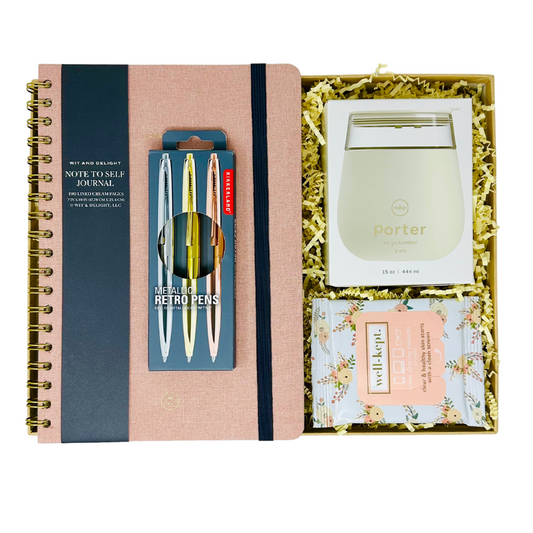 An overhead view of Me To You Box's Office Essentials gift box, showcasing an assortment of stylish and practical items perfect for enhancing productivity and organization in any office space.