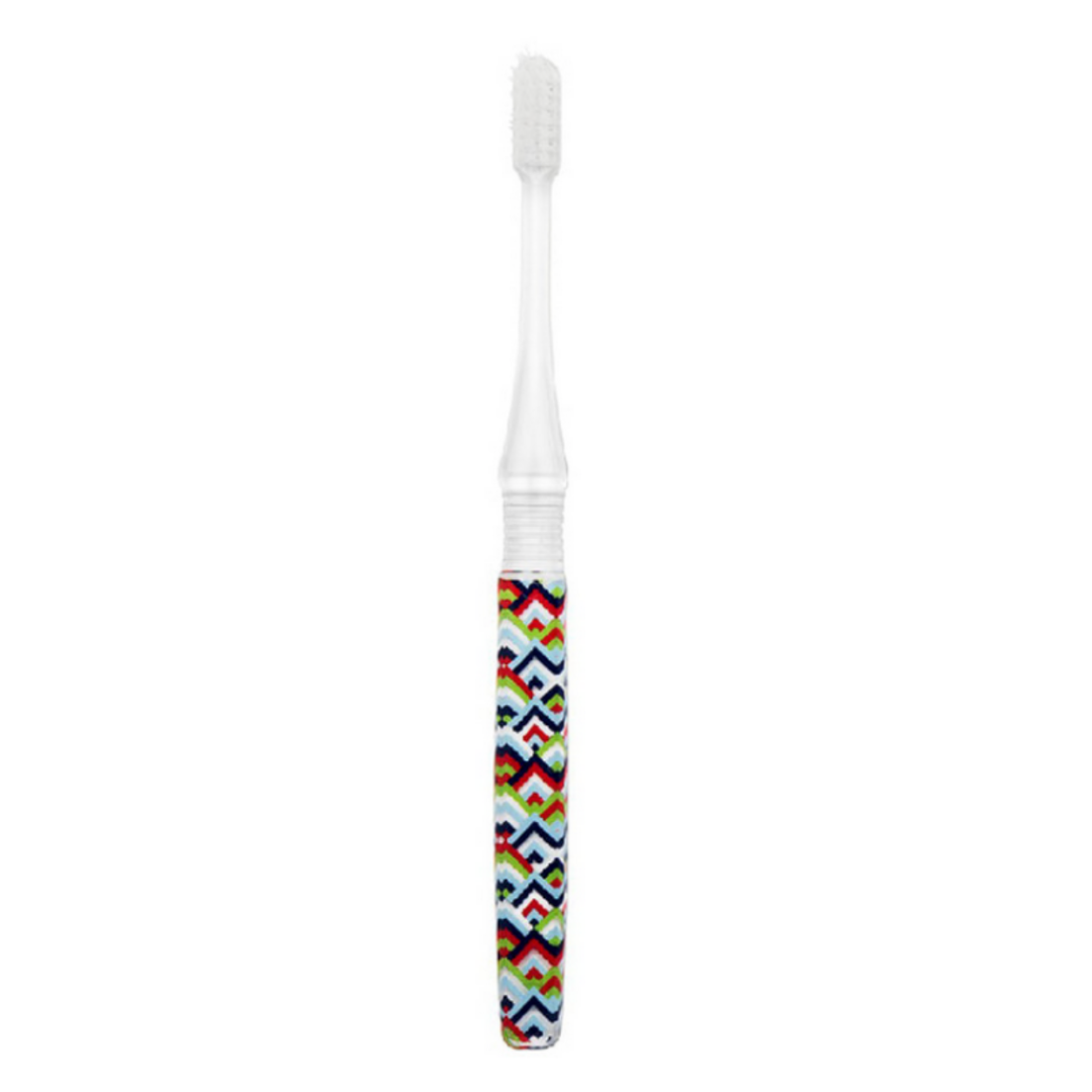 Hamico ergonomic toothbrush with a herringbone design of vibrant red, blues, and green.