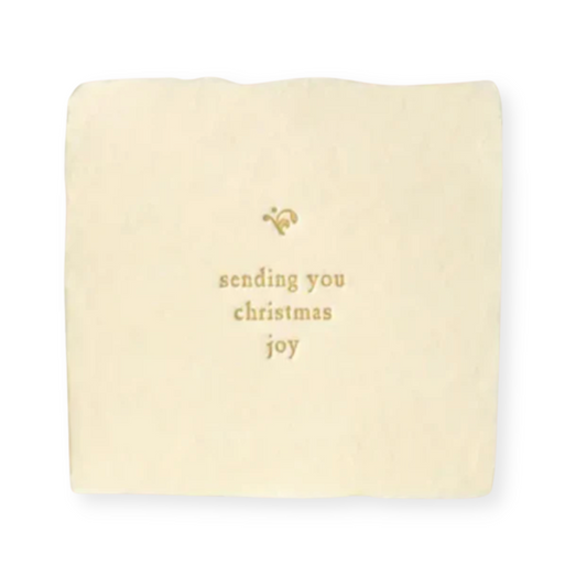 3 x 3 inch "Sending You Christmas Joy" handmade card featuring a charming design with hot foil letterpress printing on recycled cotton paper, presented inside a glassine envelope. Ideal for conveying warmth and affection in a sophisticated manner.