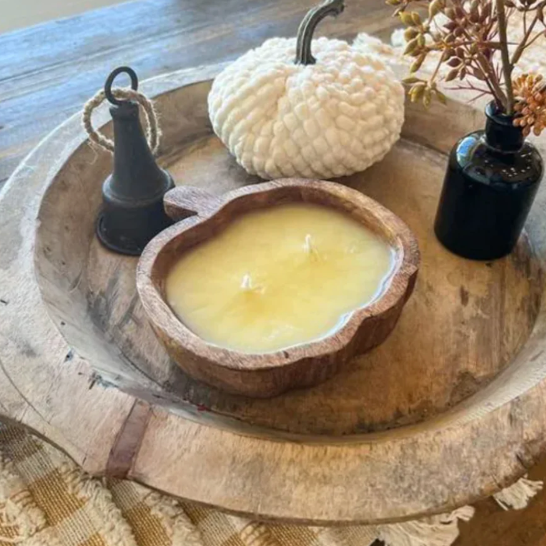 Experience the warm ambiance with a scented wooden bowl candle, shaped like a pumpkin – a charming addition to your fall home decor.